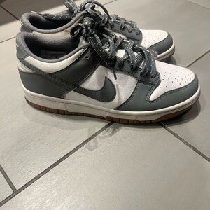 Nike Dunk Lows Boys Youth Dark Gray and White Sneakers.
